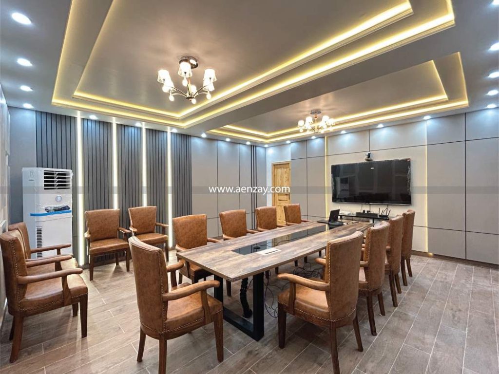 Modern corporate office interior design with large meeting table